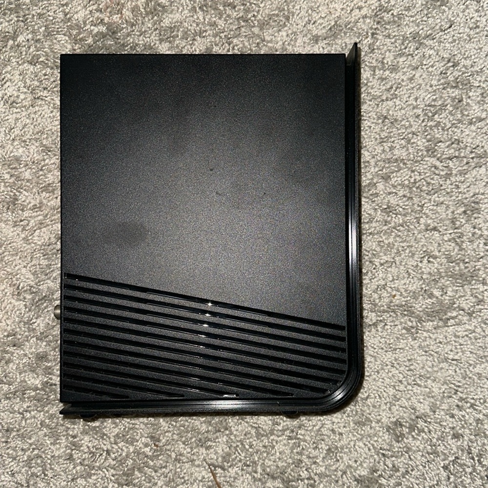 Arris Wi-Fi router with a charger